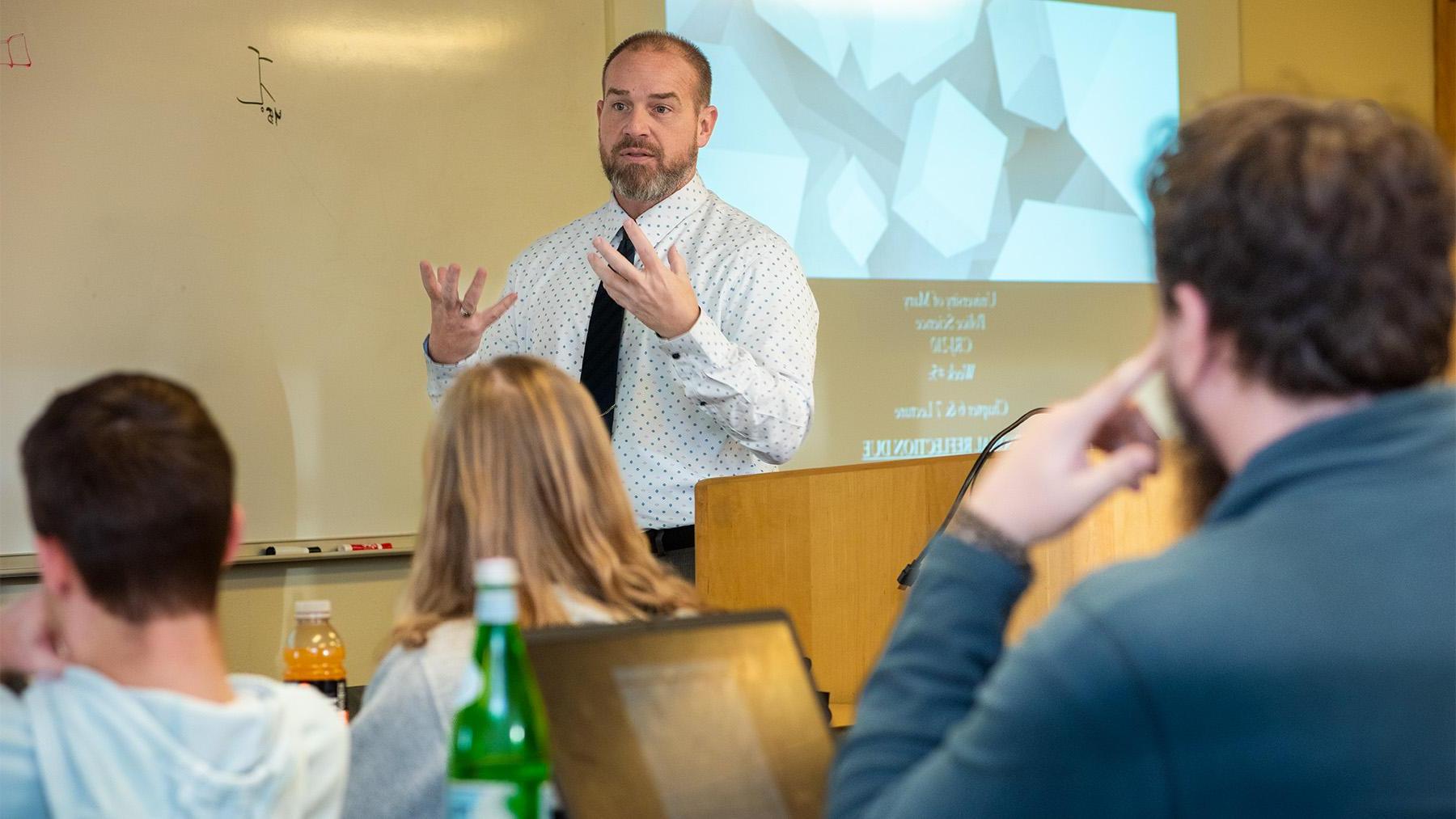 Crimial Justice professor teaching a class.